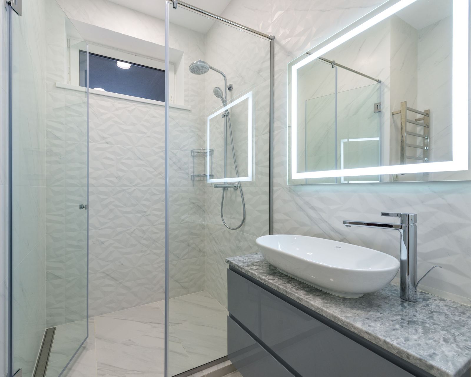Shower with a glass enclosure